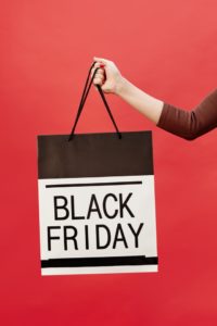Black Friday shopping bag held by shopper